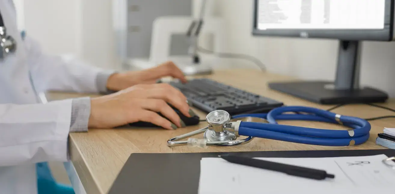 Doctor using EHR software