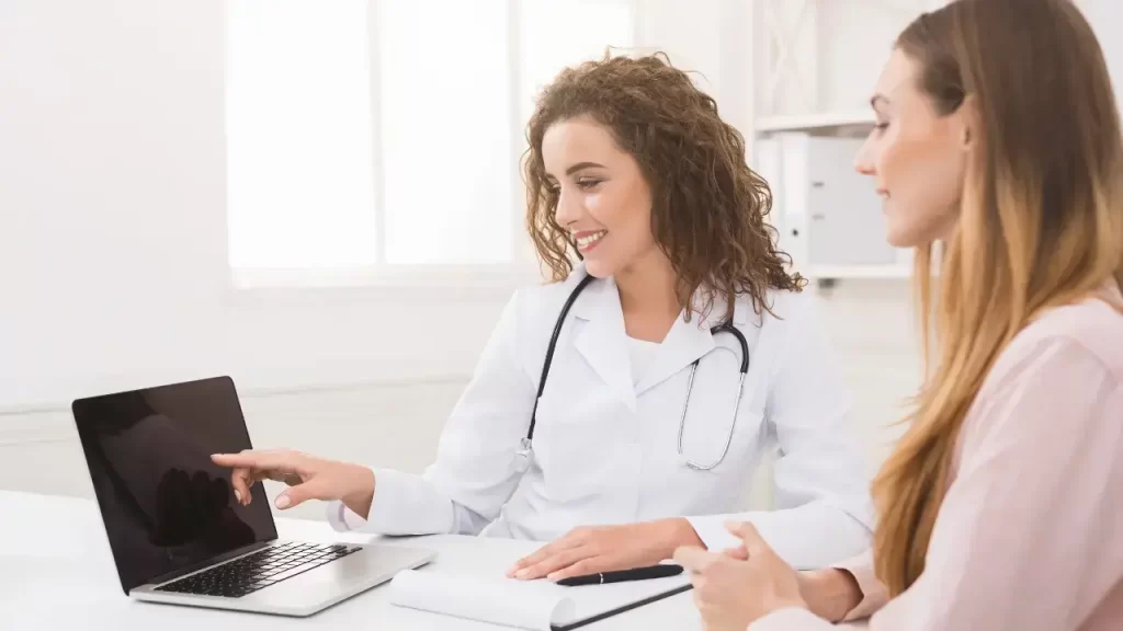 doctor checking EHR software features